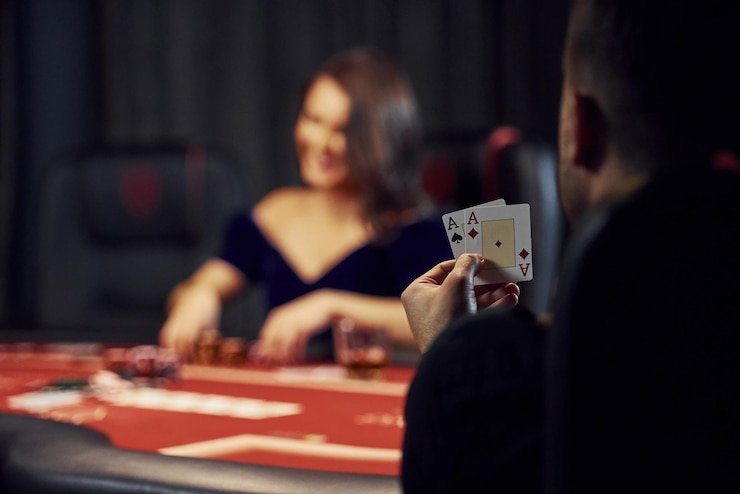Live dealer at BandarQ blackjack table with HD multi-camera feed